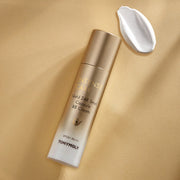 ProtoClinical k-beauty TONYMOLY Intense Care Gold 24K Snail Capsule BB Cream 50ml single upright gold-beige cosmetic package centered on a warm beige background.