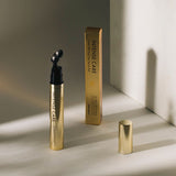 ProtoClinical k-beauty TONYMOLY Intense Care Gold 24K Snail Eye Serum Ball 15ml single eye serum package shown upright on a clean light background