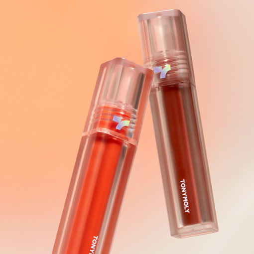 ProtoClinical k-beauty TONYMOLY PERFECT LIPS SHOCKING LIP (14 Colors) 4g single upright coral lip tint tube centered on a pale cream background