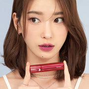 ProtoClinical k-beauty TONYMOLY PERFECT LIPS SHOCKING LIP (14 Colors) 4g single upright lip tint tube with warm brown and peach tones centered on a pale background