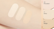 ProtoClinical k-beauty warm beige makeup swatch on a pale background.