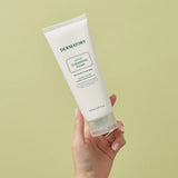 ProtoClinical k-beauty DERMATORY Pro Trouble Acne Cleansing Foam 150ml single upright gray cleansing foam tube centered on a soft white background