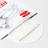 ProtoClinical k-beauty DERMATORY Retinal Derm Band Mask 28g X 6ea close-up of an opened white-and-peach sachet with a folded white mask on a clear round dish