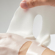 ProtoClinical k-beauty DERMATORY Retinal Glutathione Radiance Gel Mask 22g X 3ea close-up of a translucent sheet mask being lifted by hand over a face