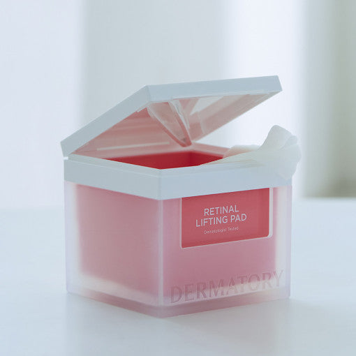 ProtoClinical k-beauty DERMATORY Retinal Lifting Ampoule Pad 80 Pads single upright pink ampoule pad container centered on a pale aqua and lavender background