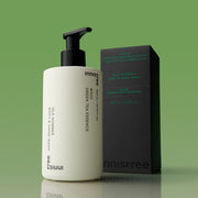 ProtoClinical k-beauty deep plum beauty packaging silhouette with soft green side accents on a light background.