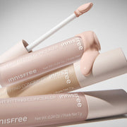 ProtoClinical k-beauty innisfree Light Fitting Concealer 7g #Salmon Beige single slim concealer package centered on a pale beige background with soft blue corner accents