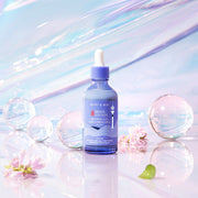 ProtoClinical k-beauty muted blue vertical beauty product silhouette centered on a pale blue background.