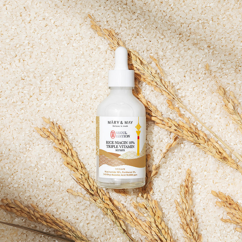 ProtoClinical k-beauty warm beige beauty graphic with soft vertical taupe bands on a light background.