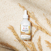 ProtoClinical k-beauty warm beige beauty graphic with soft vertical taupe bands on a light background.