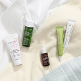 [MARY & MAY] Soothing Trouble Care Travel Kit (5pcs) by ProtoClinical displayed with multiple travel kit products on a light neutral background for a k-beauty skincare routine.