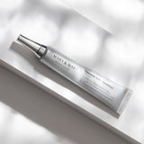 ProtoClinical k-beauty soft gray beauty graphic with a darker lower-left form on a light background.