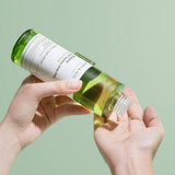 ProtoClinical k-beauty soft green beauty graphic with darker olive accents on a light background.