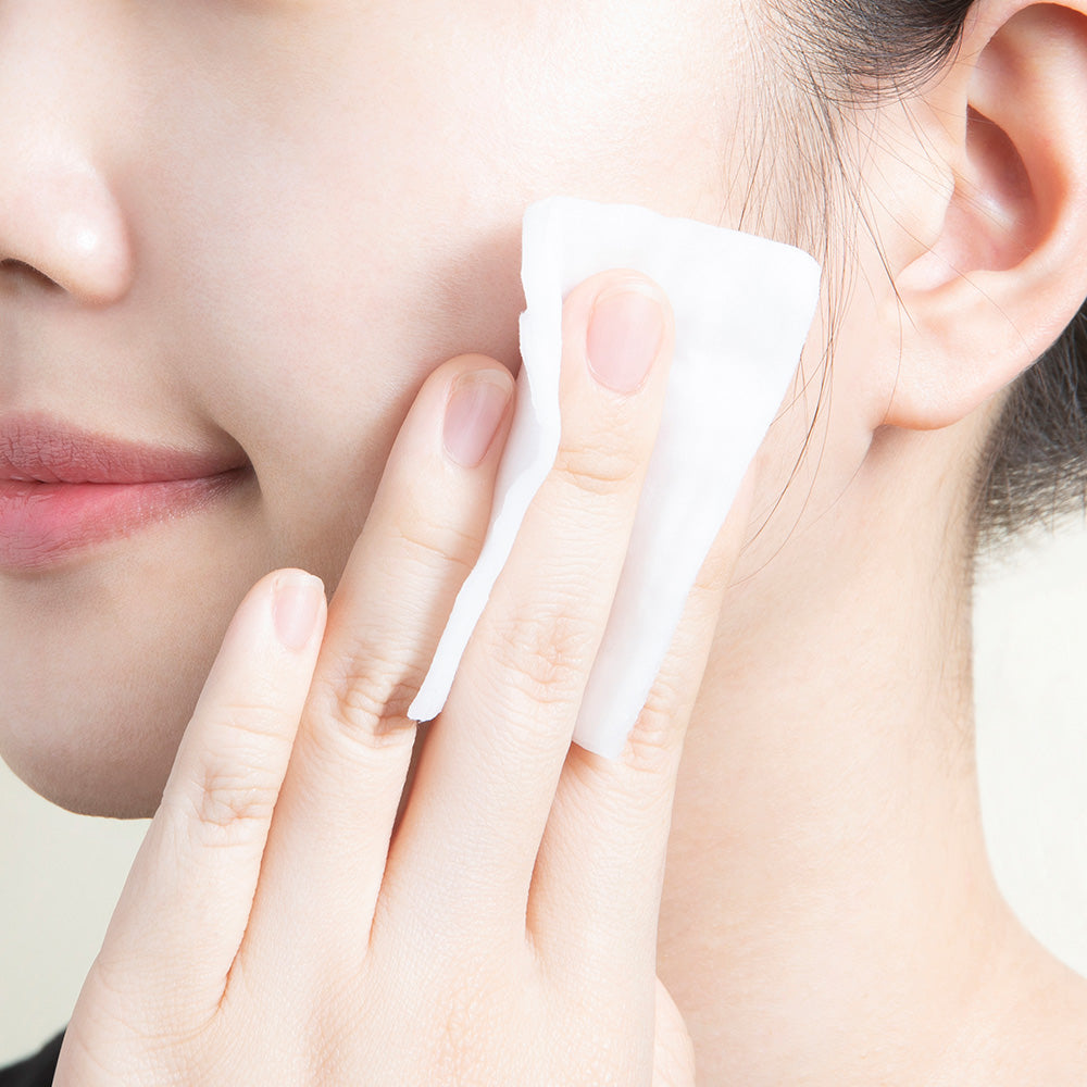 ProtoClinical k-beauty pale peach beauty graphic with soft cream and pink blocks on a light background.