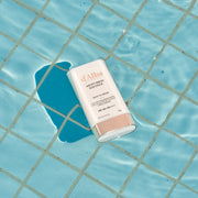 ProtoClinical k-beauty aqua beauty product silhouette with a pale center on a cool blue background.