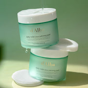 ProtoClinical k-beauty d'Alba Daily Mild Cica Calming Pad 165ml (50ea) displayed as green jar-style pad packaging in a centered studio packshot