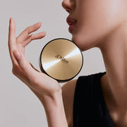 ProtoClinical k-beauty warm brown beauty product silhouette with a deep olive center on a light background.