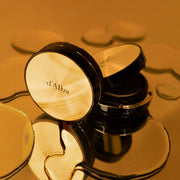 ProtoClinical k-beauty yellow-green beauty graphic with a warm orange lower band and a darker center.