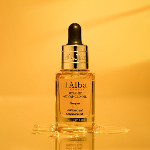 ProtoClinical k-beauty golden beauty product silhouette with a darker center on a warm light background.