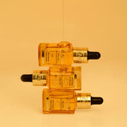ProtoClinical k-beauty warm golden beauty graphic with soft horizontal bands on a light background.