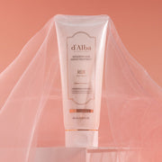 ProtoClinical k-beauty coral beauty graphic with a pale vertical center on a soft peach background.