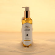 ProtoClinical k-beauty pale beige beauty product silhouette with a muted brown vertical center on a light background.