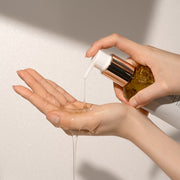 ProtoClinical k-beauty soft cream beauty graphic with a peach center and deep brown upper-right accent on a light background.