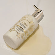 ProtoClinical k-beauty tall beige product silhouette with pale blue side tones on a light background.