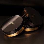 ProtoClinical k-beauty deep brown beauty product silhouette with a soft vertical highlight on a dark background.