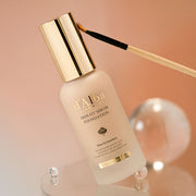 ProtoClinical k-beauty warm peach beauty graphic with an orange vertical band and a muted green lower-left area.