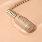 ProtoClinical k-beauty warm peach beauty graphic with a soft beige center and a darker tan oval on the right.