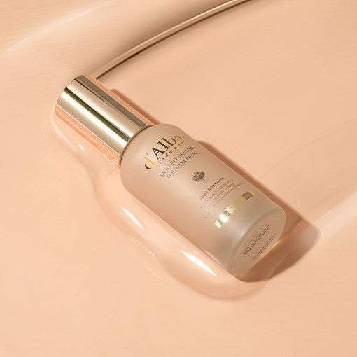 ProtoClinical k-beauty warm peach beauty graphic with a soft beige center and a darker tan oval on the right.