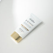 ProtoClinical k-beauty soft taupe beauty product silhouette with a pale center on a muted gray background.