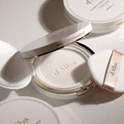 ProtoClinical k-beauty taupe and cream beauty product packaging with a darker lower center on a light background.