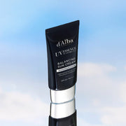 ProtoClinical k-beauty dark bottle silhouette centered above a soft white base with pale blue side panels.