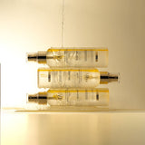 ProtoClinical k-beauty warm beige beauty product packaging with a dark vertical center on a light background.