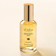 ProtoClinical k-beauty pale cream and yellow beauty product packaging on a light background.