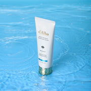 ProtoClinical k-beauty blue beauty product packaging with a dark vertical center on a light background.