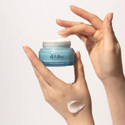 ProtoClinical k-beauty soft beige beauty product packaging with a warm brown vertical center on a light background.
