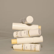 ProtoClinical k-beauty d'Alba White Truffle Nourishing Serum Lip Balm 3.6g shown in a square layout with dark gray, pink, beige, and light background blocks