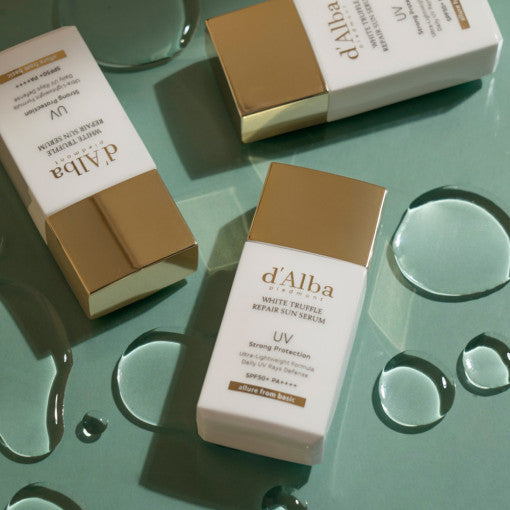 ProtoClinical k-beauty muted sage and gray beauty product packaging on a cool light background.