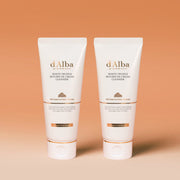 ProtoClinical k-beauty peach and cream beauty product packaging with warm rose accents on a light background.