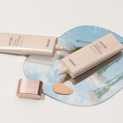 ProtoClinical k-beauty dark gray beauty compact silhouette on a pale background.
