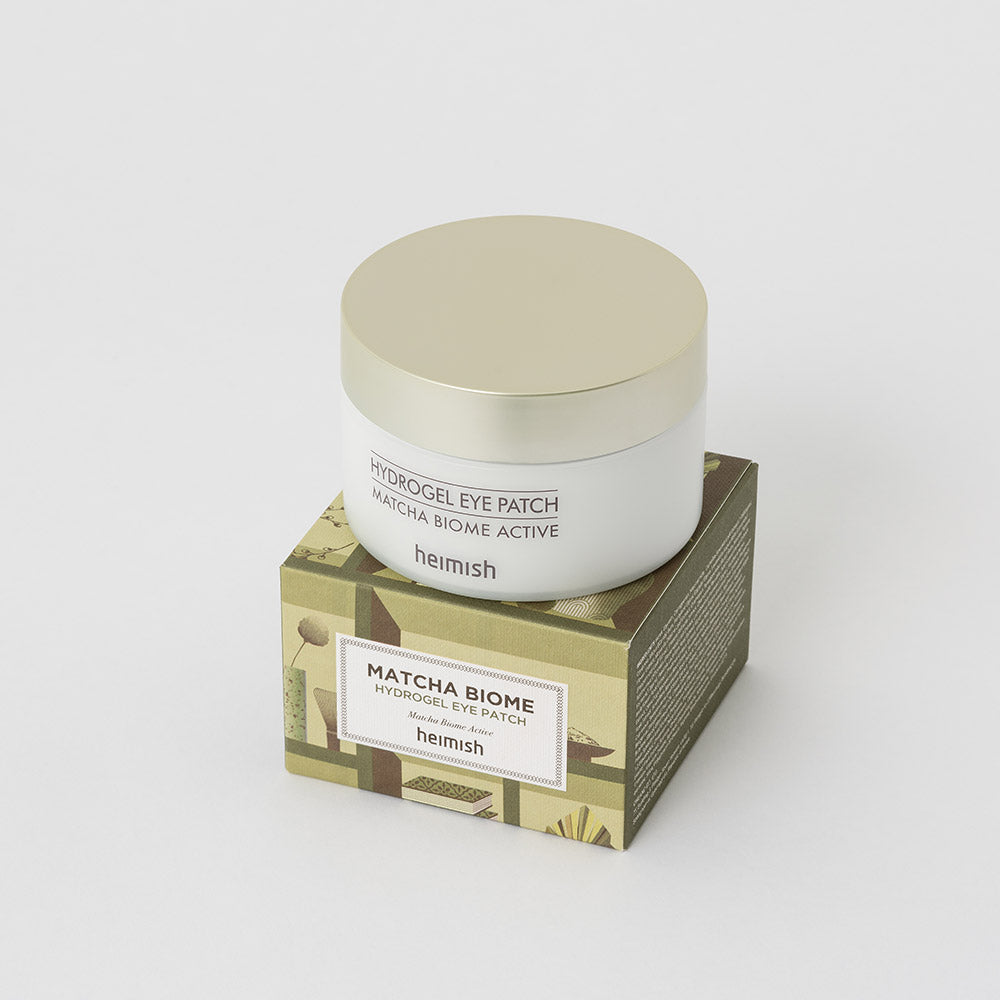 ProtoClinical k-beauty heimish Matcha Biome Hydrogel Eye Patch 1.4g X 60pcs single pale olive eye patch package standing upright on a light background with pale blue side accents