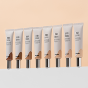 ProtoClinical k-beauty horizontal beige and taupe makeup swatch on a light background.