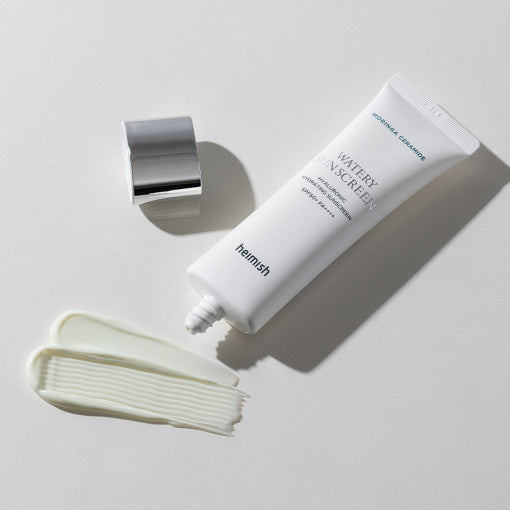 ProtoClinical k-beauty warm beige beauty product silhouette with soft olive and blush tones on a light background.