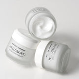 ProtoClinical k-beauty light gray beauty graphic with soft beige lower-right accents on a pale background.