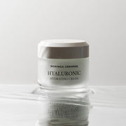 ProtoClinical k-beauty pale gray beauty product silhouette with a soft olive center on a white background.