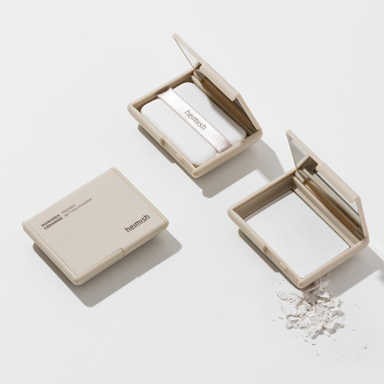 ProtoClinical k-beauty soft beige skincare product packaging on a light background.