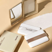 ProtoClinical k-beauty warm tan cosmetic product on a beige background.